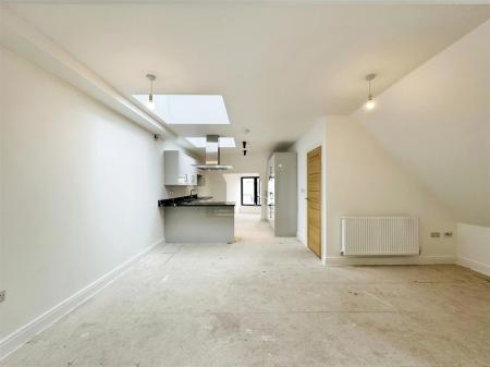 Living area to kitchen