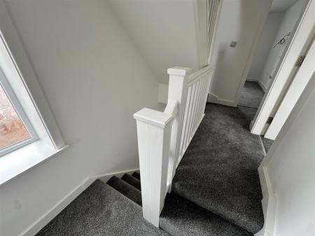 Landing to first floor