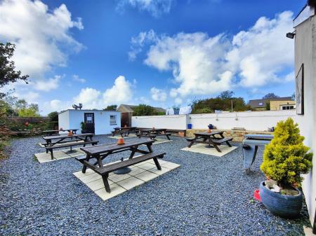 Large Slate Chip and Paved Patio Area