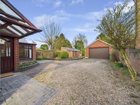 OUTSIDE - DRIVEWAY