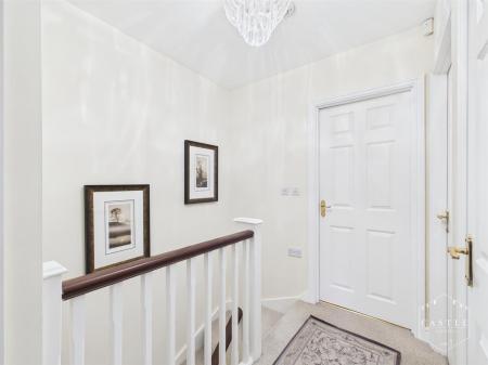 FIRST FLOOR LANDING