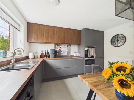 OPEN PLAN LIVING AREA AND KITCHEN
