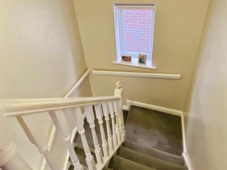 Stairs to first floor and landing