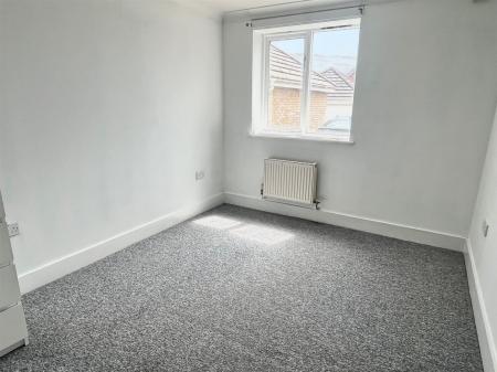 Bedroom 2 lightened.jpg