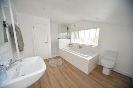 En suite bathroom to  primary.jpg