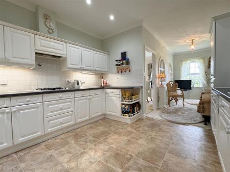 KITCHEN WITH GARDEN ROOM