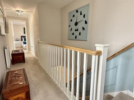 FIRST FLOOR LANDING