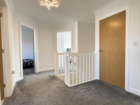 FIRST FLOOR LANDING
