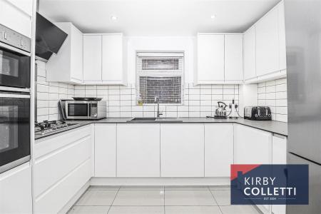 RE FITTED KITCHEN