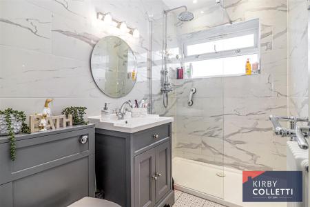 RE FITTED SHOWER ROOM