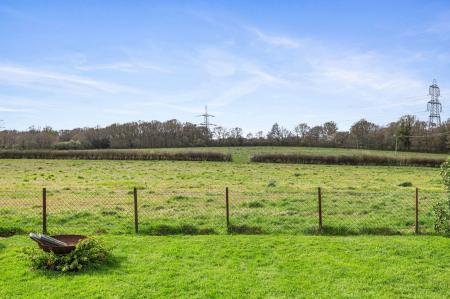 Field behind gardens