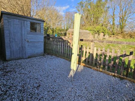 Wood shed and washing area