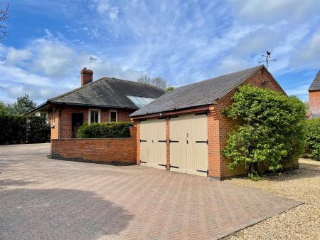 Frontage, Driveway & Double Garage