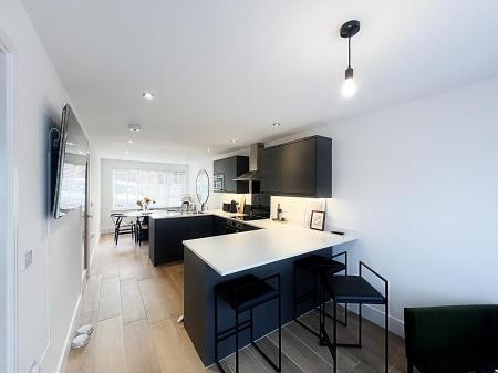 Family Room with Dining Area and Kitchen