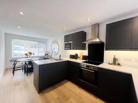 Family Room with Dining Area and Kitchen