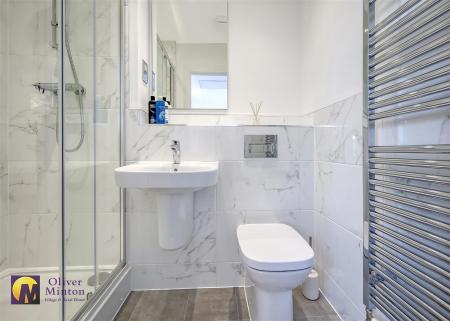 EN-SUITE SHOWER ROOM