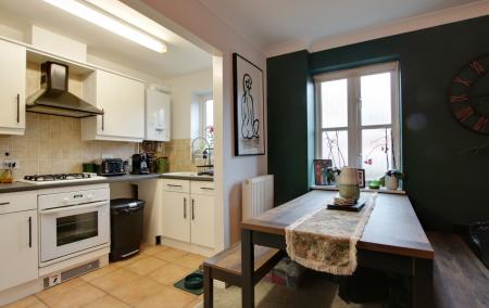 DINING AREA THROUGH TO KITCHEN