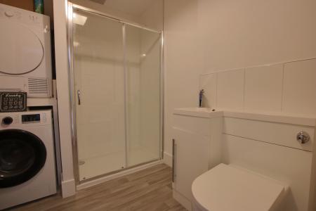 SHOWER ROOM/UTILITY ROOM