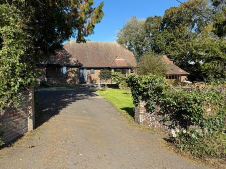 FRONT VIEW WITH DRIVEWAY