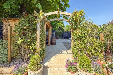 Archway to rear part of garden