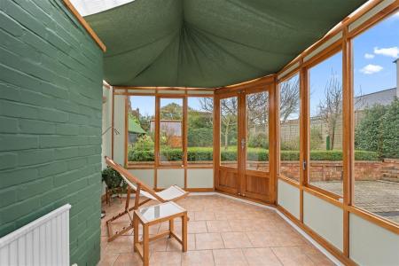 L SHAPED CONSERVATORY