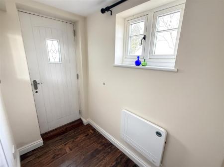 INITIAL ENCLOSED VESTIBULE