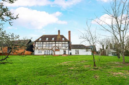 1389384-11-694000...