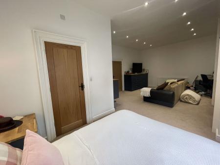 Basement Lounge Area and Bedroom