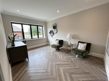 Tv Room/Playroom: