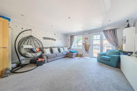 TV Room/Playroom: