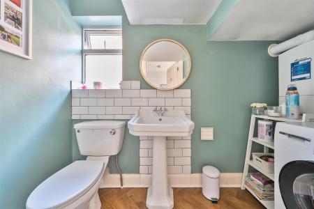 Guest Cloakroom/Utility Room: