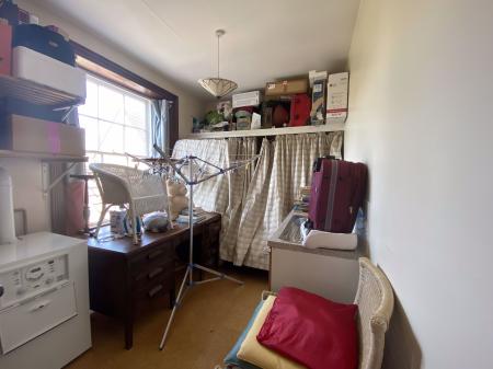 Laundry Room/Bedroom 4