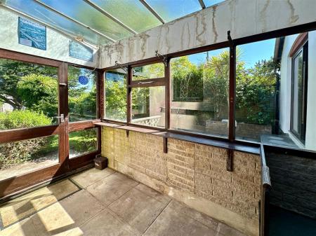 Rear Sun Porch Towards Patio.JPG