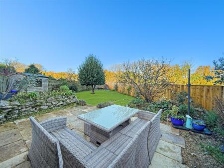 Patio Seating Area Into Gardens.JPG