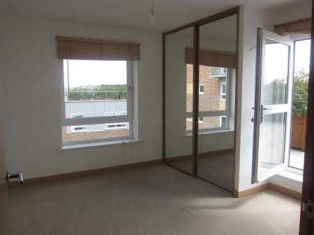 Bedroom with access to roof terrace