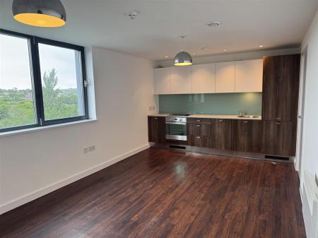 lounge kitchen mid shot.JPG